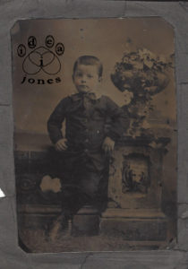 This isn't in bad shape for a picture from the 1890s, but there's a lot of work to do.